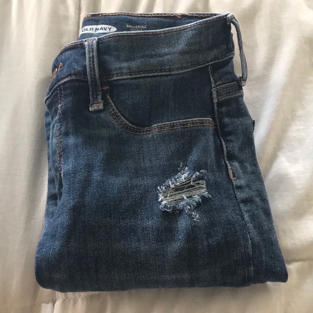 Girls size 14 medium wash ripped jeans